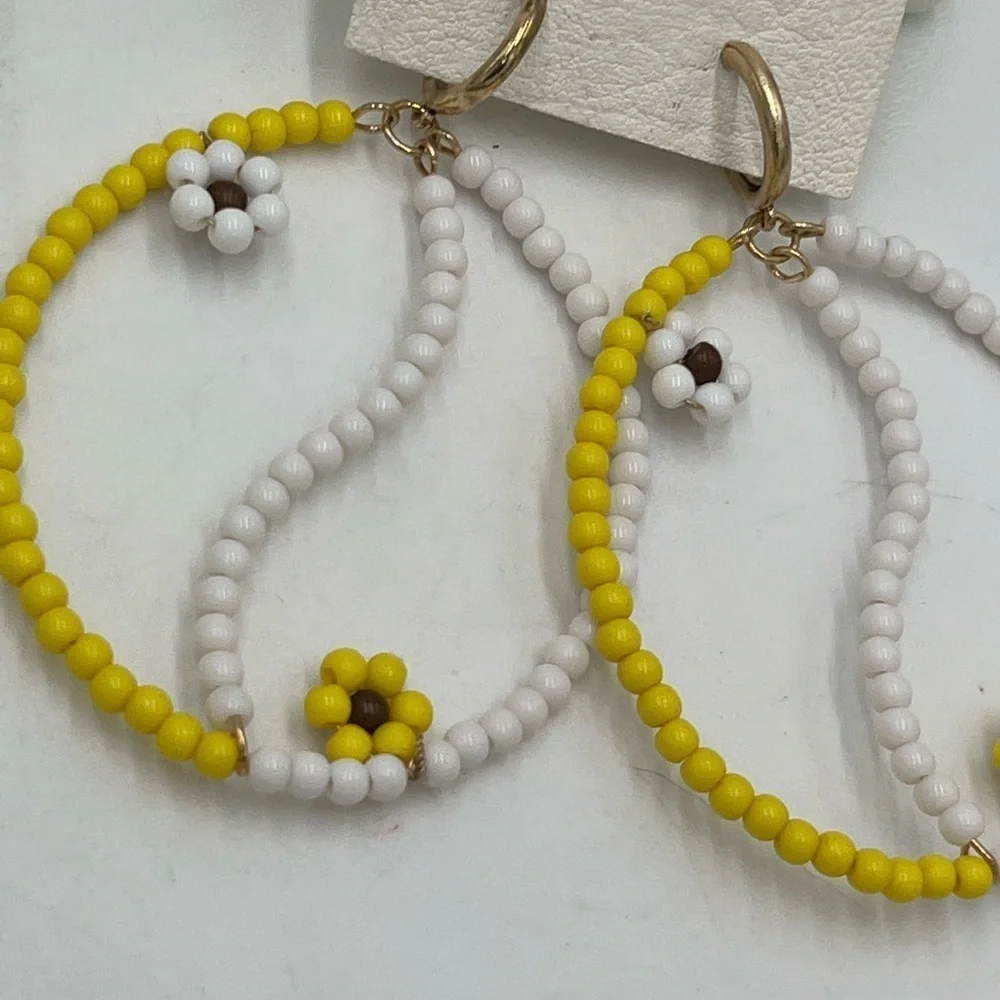 FREE PEOPLE AMONG THE‎ WILDFLOWERS HOOP YIN AND YANG YELLOW/WHITE  EARRINGS